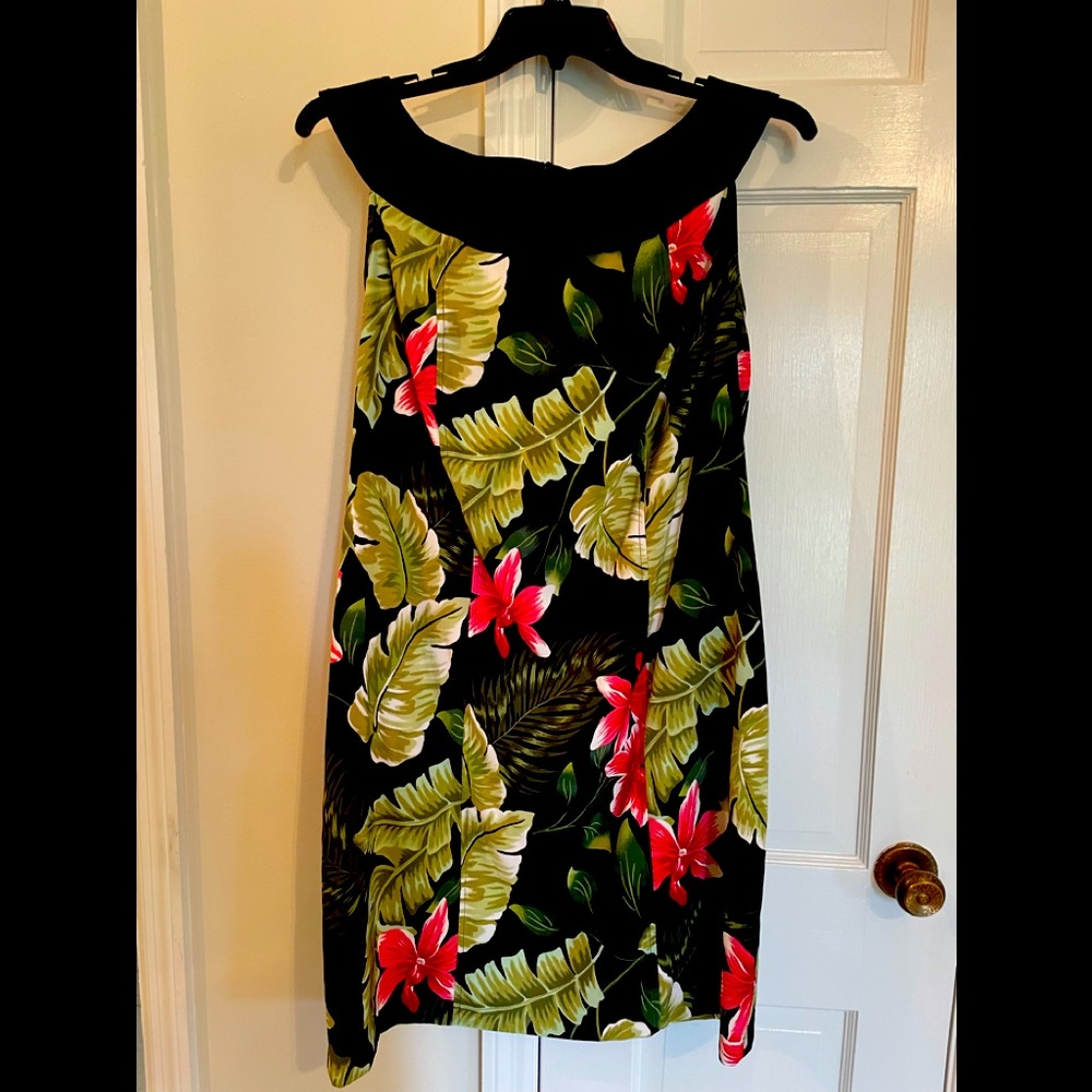Dress is polyester with spandex